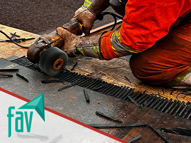 A person preparing a steel belt for FXC Fastening